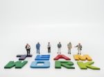 Miniature Bussinessman With Teamwork Word Letters On White Backg Stock Photo