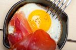 Egg Sunny Side Up With Italian Speck Ham Stock Photo