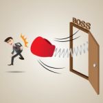 Cartoon Businessman Punch Out Of Boss Room Stock Photo