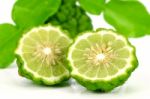 Fresh Fruits And Green Leaves Of Kiffir Lime Or Leech Lime On Wh Stock Photo