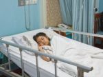 Girl In Hospital Stock Photo