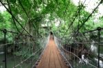 Wooden Suspension Bridge Cross Small River To House Stock Photo