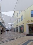 Faro, Southern Algarve/portugal - March 7 : Sails Over The Stree Stock Photo