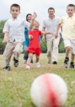 Outdoors Running Towards The Foot Ball Stock Photo