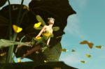 3d Rendering Of A Happy Fairy Flying Out From A Big Green Leaf Stock Photo