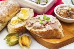 Goose Liver And Sauternes Pate With Chutney, Physalis, Sliced Br Stock Photo