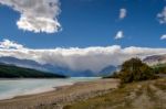 Storm Clouds Gathering Over Lake Sherburne Stock Photo