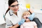 Child On Her Dental Check Up Stock Photo