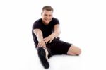 Man doing Stretching exercise Stock Photo