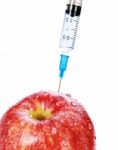 Apple And Syringe Stock Photo