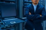 Man Fix Server Network In Data Center Room Stock Photo