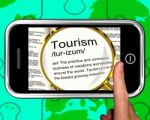 Tourism Definition On Smartphone Shows Traveling Abroad Stock Photo