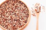 Organic Dry Multi Grain Rice In Wooden Bowl Stock Photo