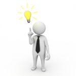 Businessman With Idea Light Bulb Stock Photo