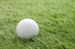 Side Golf On Green Grass Field Stock Photo