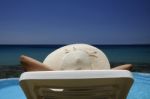 Woman Resting Over The Sea Stock Photo