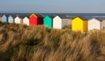 Colourful Beach Huts At Southwold Stock Photo