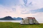 Camping On The Ocean Coast. Vacation In Norway Stock Photo