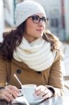 Portrait Of Young Beautiful Woman Drinking Coffee Outdoor Stock Photo