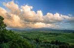 Pienza, Tuscany/italy - May 19 : Farmland Below Pienza In Tuscan Stock Photo