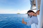 Tourist Woman Traveling By Boat Stock Photo