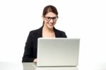 Businesswoman Working On Laptop Stock Photo