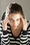 Woman With A Headache Stock Photo