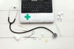 Laptop Computer And Retro Medical Instruments Stock Photo