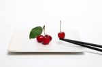 Cherry On Chopstick Stock Photo