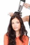 Combing And Drying The Hair Stock Photo