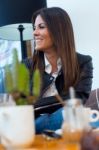 Beautiful Young Woman Drinking Coffee In Cafe Shop Stock Photo