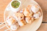 Squid Grilled Ball On Wooden Plate Stock Photo