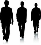 Silhouette guys walking Stock Photo