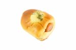 Sausage In Bread And Cheese On White Background Stock Photo