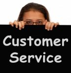 Girl Showing Customer Service Board Stock Photo