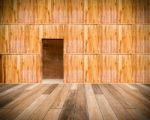 Wooden Wall With Door And Wood Floor In Front Off Stock Photo