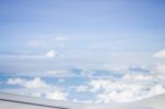 Cloudy Sky View From Airplane Cabin Window Stock Photo