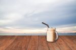 Iced Coffee Cup With Blue Sea View Stock Photo