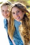 Beautiful Young Girls Looking At The Camera Stock Photo