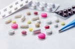 Top View Of The Pills On The White Background, Pack Of Tablet Drug And Capsule Pills On The Floor Stock Photo