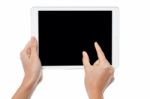 Fingers Being Pointed On Tablet Screen Stock Photo