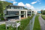 View Of New Apartments By The Lake In Attersee Stock Photo