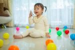 Little Girl Talking On Mobile Phone Stock Photo