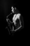 Portrait Of The Men With Saxophone Stock Photo