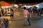 Tourists Walk To Shop At Night Market Srinakarin Road Or Train Market, Thailand Stock Photo