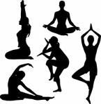 Silhouette Girls Doing Yoga Stock Photo