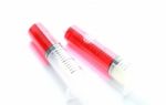 Syringe With Red Liquid Isolated On White Background Stock Photo