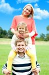 Happy Family In Outdoor Stock Photo