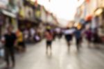 Blurred People Walking On The Street Stock Photo