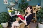 Portrait Of Thai Adult Women Office Beautiful Girl Reading Book Stock Photo